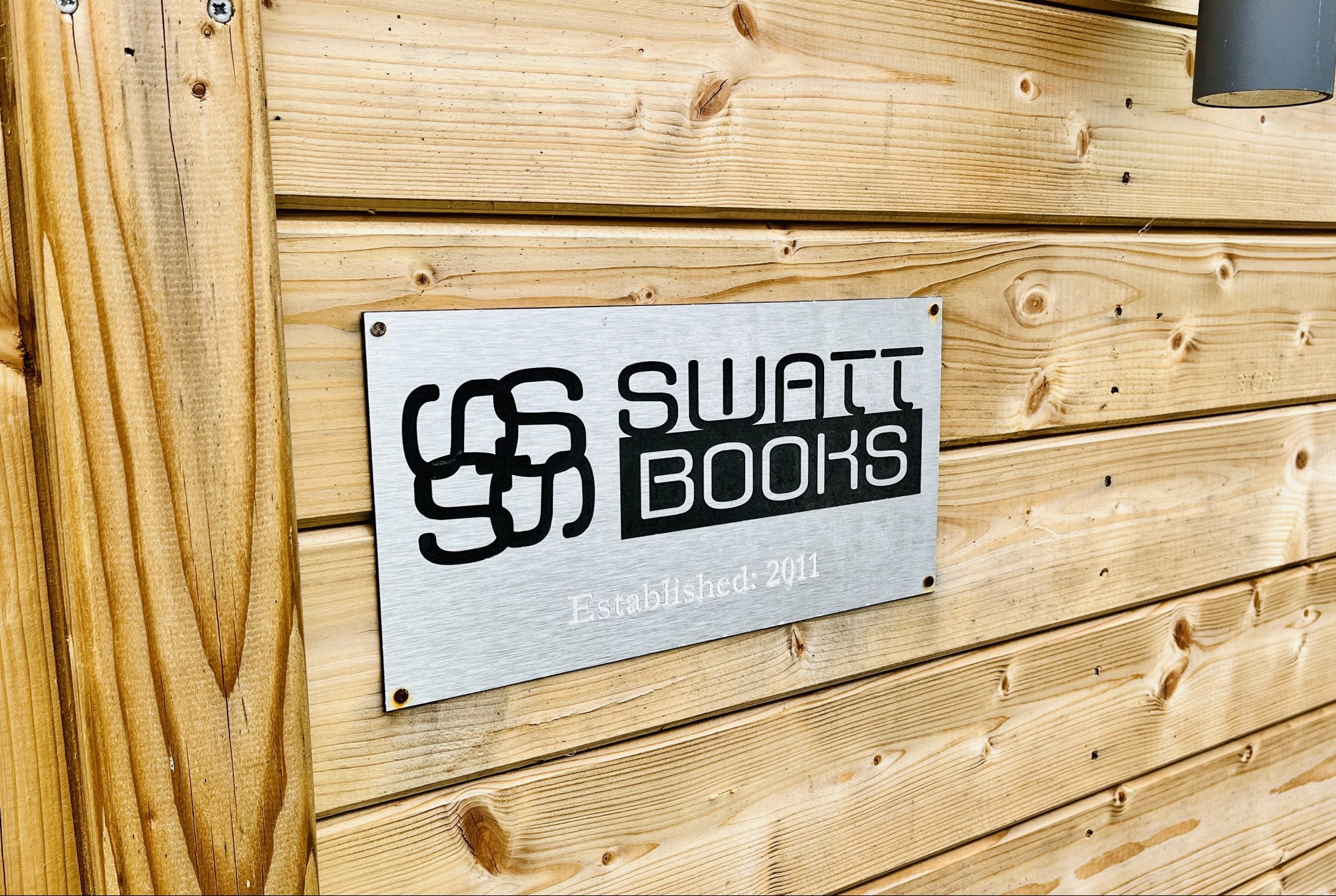 SWATT Books office plaque